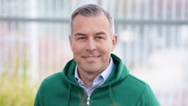 Photo of Marko Groydanovic wearing a green hoodie