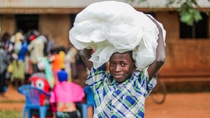 Child carrying end-of-life mosquito net