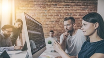 Developing programming and coding technologies. Website design. Programmer working in a software develop company office Developing programming and coding technologies. Website design. Programmer working in a software develop company office