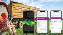 A farmer looks at the xarvio® FIELD MANAGER app.