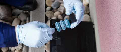 Hands holding an insecticide