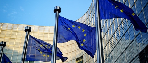 EU flags in front of European Commission in Brussels