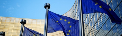 EU flags in front of European Commission in Brussels