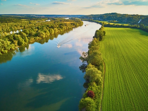 Scenic aerial view of the Seine river and green fields in French countryside. Val d'Oise department, Ile-de-France, Northern France; Shutterstock ID 1898268388; purchase_order: 1086744798; job: Annegret Liebscht; client: APB/KS; other: 20782208 Scenic aerial view of the Seine river and green fields in French countryside. Val d'Oise department, Ile-de-France, Northern France; Shutterstock ID 1898268388; purchase_order: 1086744798; job: Annegret Liebscht; client: APB/KS; other: 20782208