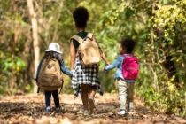 Three kids holding hands